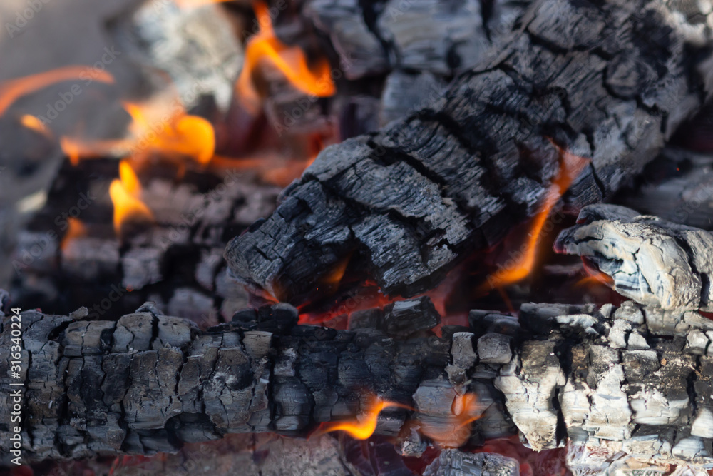 Glowing Hot Charcoal In BBQ Grill Pit With Flames Background Texture, Close-up Glowing Hot Charcoal In BBQ Grill Pit With Flames Background Texture, Close-up