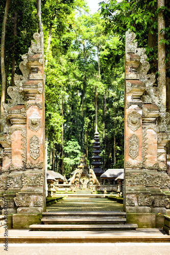 (Selective focus) Stunning view of a Balinese gate located at the entrance of the Sangeh Monkey Forest in Ubud, Bali, Indonesia.  photo