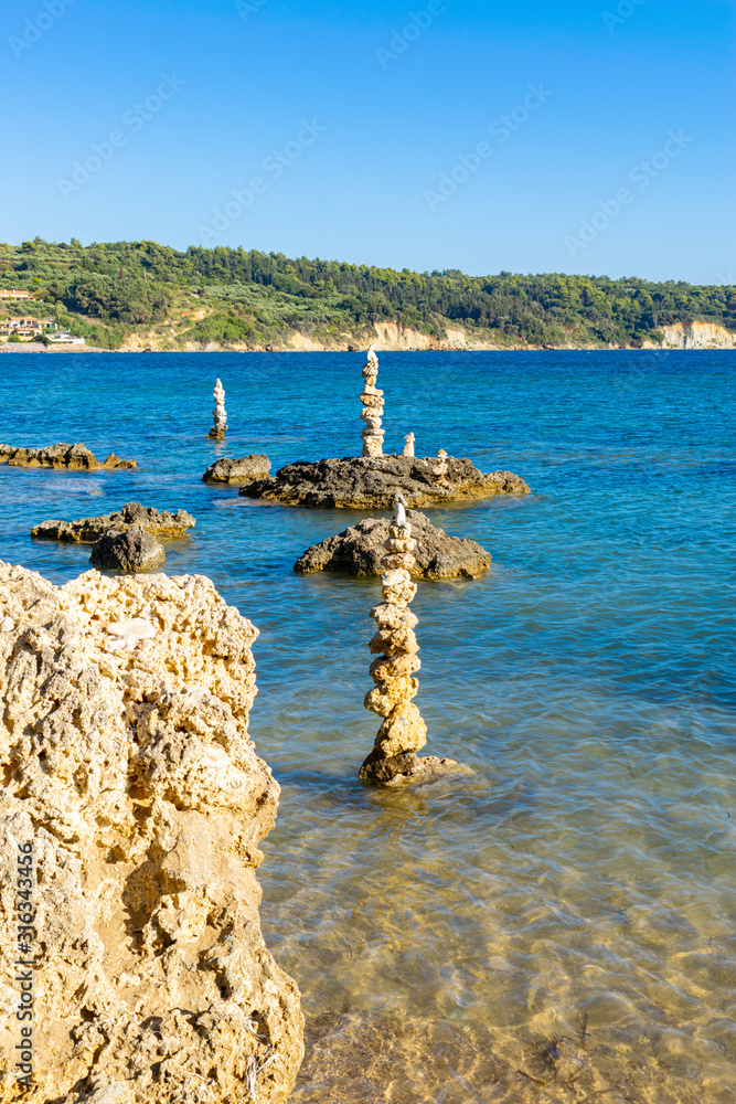 Balance stones at Matzakoura beach near Katakolo, Peloponnese Balance stones at Matzakoura beach near Katakolo, Peloponnese