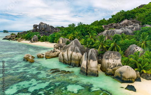 Paradise beach at summer day - beautiful and tropical coast in Indian ocean, Seychelles island