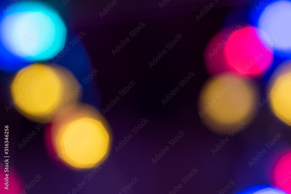 Abstract background. Close-up of blurred multicolored lights. Space for lettering or design Abstract background. Close-up of blurred multicolored lights. Space for lettering or design