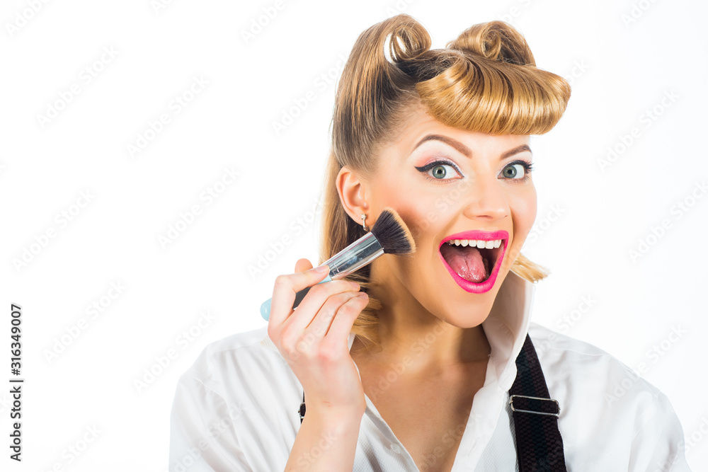 Cosmetics for advertising. Beauty blogger. Beautiful woman with face powder brush. Makeup.