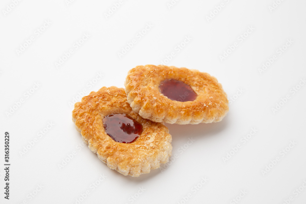 Cookies with jam on a white background