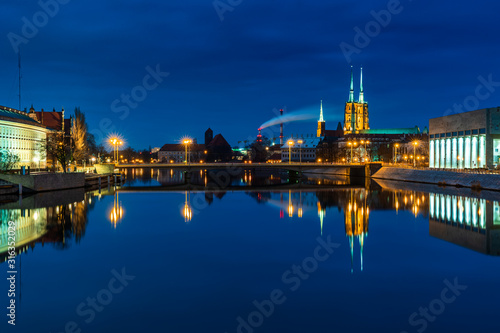 The city of Gda  sk on the Odra River at dawn.