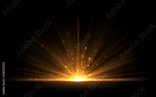 Golden glow light effect on black background