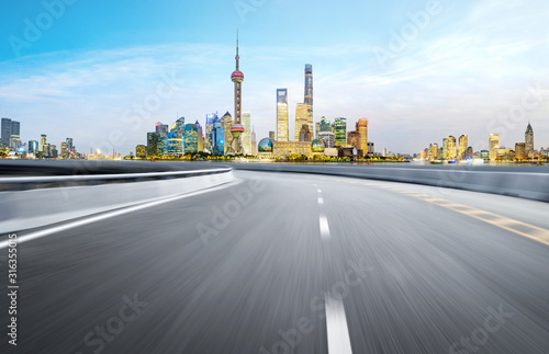 Dynamic blurry highway and city skyline in Shanghai, China