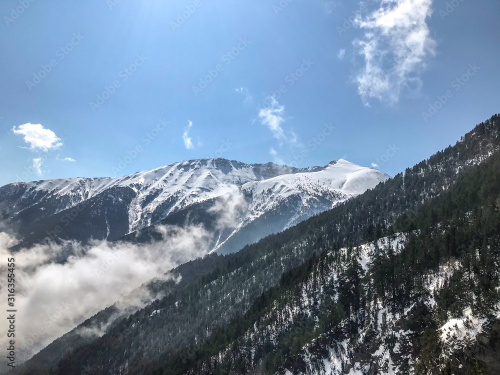 natural beautiful mountains view, hiking in mountains, clouds and forest