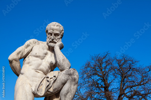 marble sculpture of a thinking philosopher