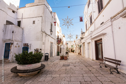 Street in the historic center of Cisternino in Puglia (Italy)