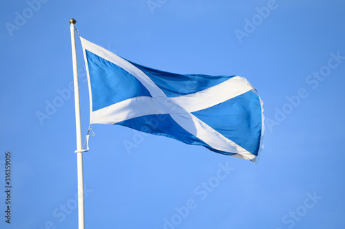 Saltire,national flag of Scotland with sky blue field. photo