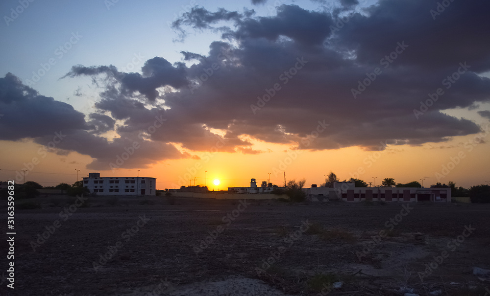 Sunset city colorful landscape, Clouds skyline trees building nature scenery view Baluchistan