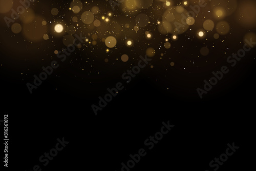 Abstract magical flying lights with golden glares bokeh on a black background. Christmas light effect. Vector illustration
