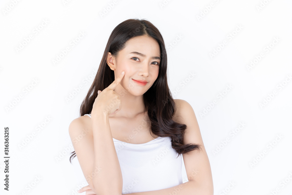 Young asian woman has smiling face and bright skin tone.Asian woman standing with isolated white background. Young asian woman has smiling face and bright skin tone.Asian woman standing with isolated white background.