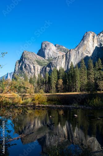 Bright cliffs and Merced river. Amazing natural view in Yosemite valley. 