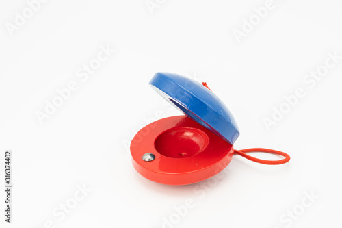 Colorful castanets for children red and blue photo