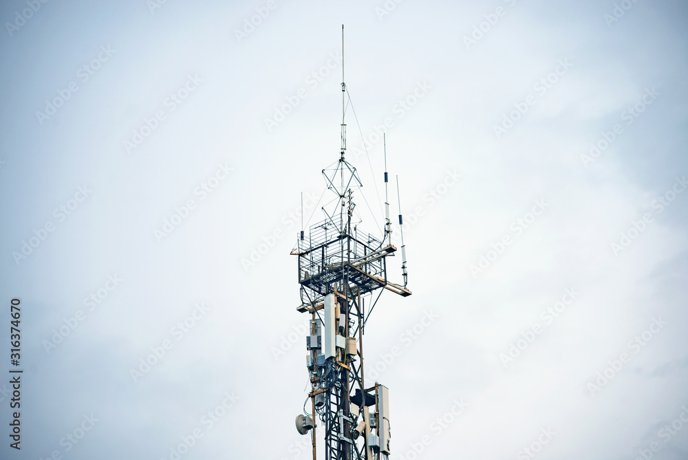 antenna mast of a radio transceiver against the sky antenna mast of a radio transceiver against the sky