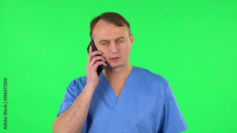 Medical man for mobile phone, very shocked then rejoice. Green screen Medical man for mobile phone, very shocked then rejoice. Green screen