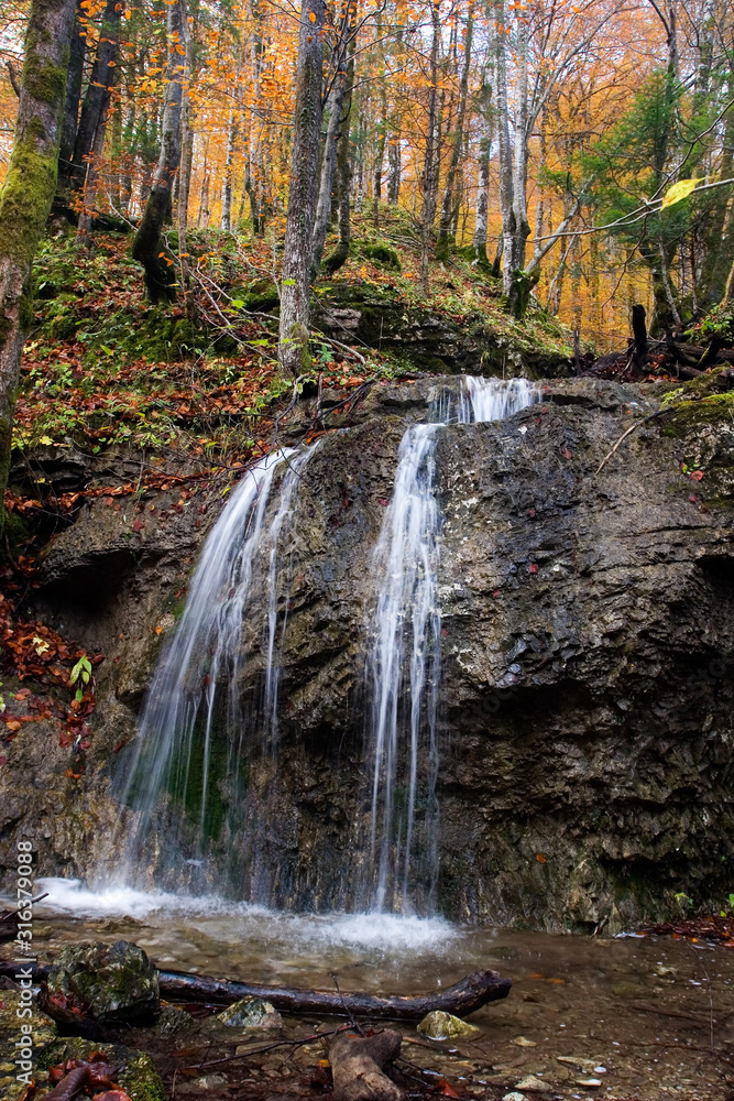 Small waterfall in the forest in autumn, Gorski kotar, Croatia Small waterfall in the forest in autumn, Gorski kotar, Croatia