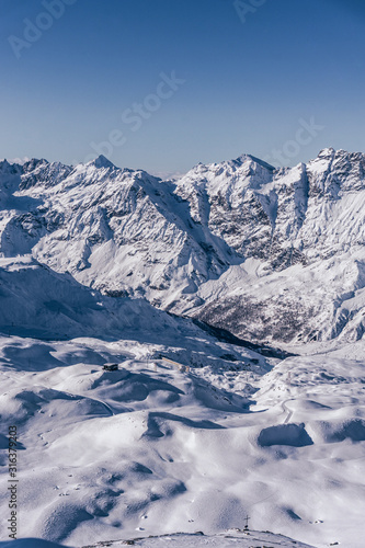 The mountains of the Aosta Valley during a fantastic winter day near the Matterhorn and the town of Breuil-Cervinia, Italy - December 2019. © Roberto