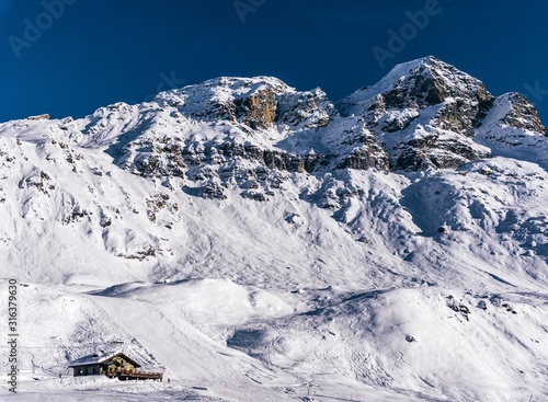 Wallpaper Mural The mountains of the Aosta Valley during a fantastic winter day near the Matterhorn and the town of Breuil-Cervinia, Italy - December 2019. Torontodigital.ca