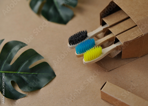 Bamboo toothbrushes on craft paper. Eco concept. Zero waste.