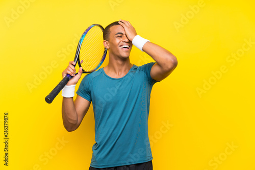 African American tennis player man has realized something and intending the solution © luismolinero