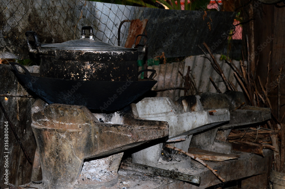 Old charcoal grills and pots that have been used for a long time Old charcoal grills and pots that have been used for a long time