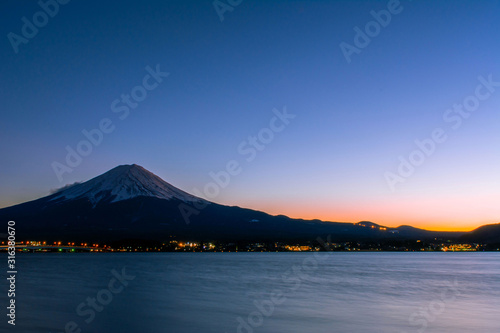 View of Mount Fuji, the sunset sky, Lake Kawaguchiko, Japan.