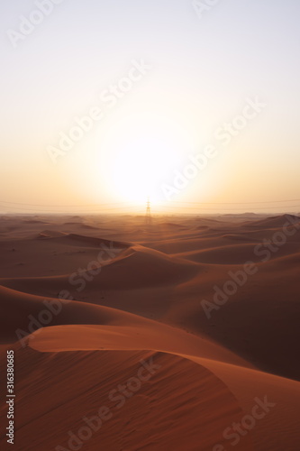 Sunrise in the red desert sand dunes of the Arabian Desert in Riyadh  Saudi Arabia