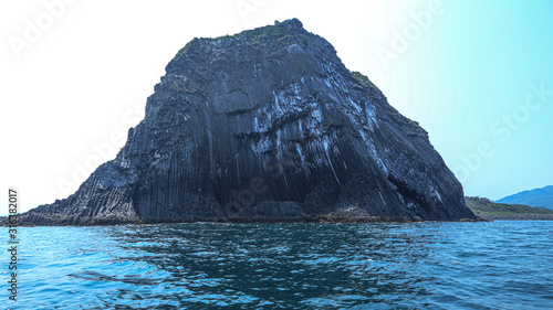 rock mountain on the sea