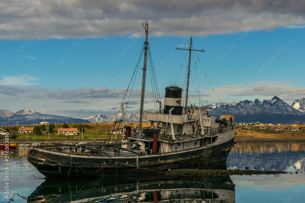 Landscape view of Saint Christopher ship on the Beagle Channel bay in Ushuaia, Tierra del Fuego, Argentina
