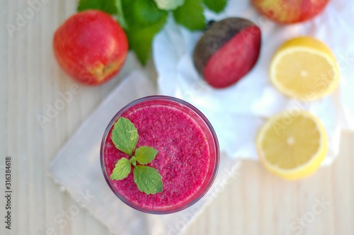 Healthy fresh smoothie drink from apple,beetroot, lemon and mint