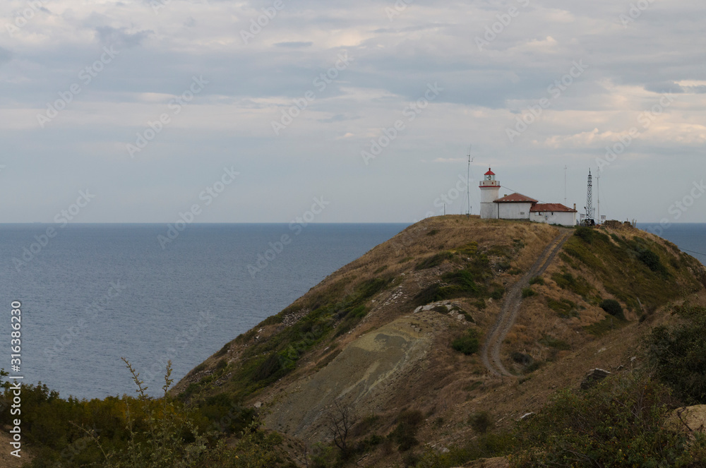 Lighthouse on the cape Emine in the early evening Lighthouse on the cape Emine in the early evening