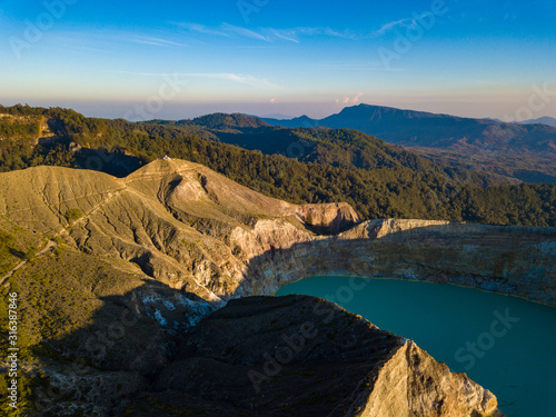 Aerial view of one of the turquoise green kelimutu lakes. Kelimutu consists of 3 lakes that change color. Danau Kelimutu, Ende, East Nusa Tenggara