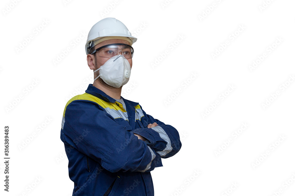 Protective equipment use work industry. Worker in a white hard hat, respirator and safety glasses on a white background Protective equipment use work industry. Worker in a white hard hat, respirator and safety glasses on a white background