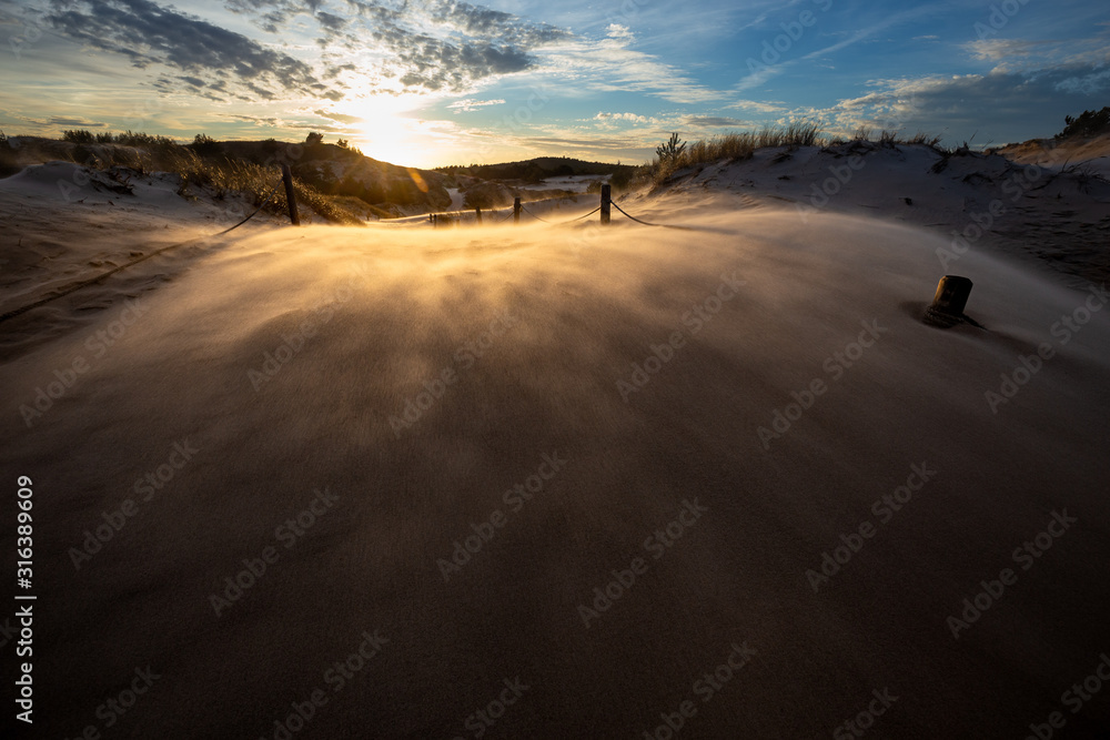 Dunes during a windy evening in the Slowinski National Park. Czolpino, Leba, Poland.