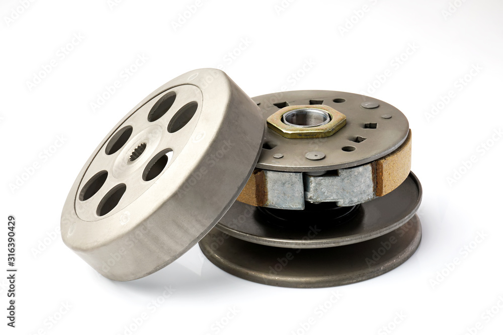 centrifugal clutch set of motorcycle or scooter on white background .Motorcycle automatic clutch uses centrifugal force with the driving shaft nested inside the driven shaft.