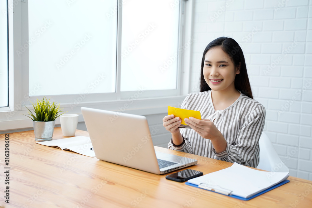 woman working on her laptop at home woman working on her laptop at home