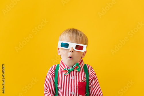 Happy child wearing 3d glasses