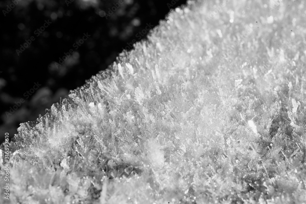close-up of frozen snow with visible crystals                              