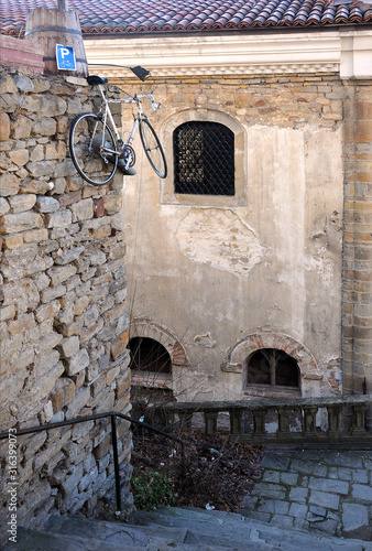 Suspended bicycle in the lane photo