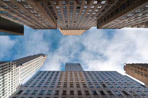 New York City midtown modern office skyscrapers buildings. Bottom view.