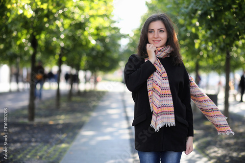 Beautiful girl in the park for a walk © alexkich