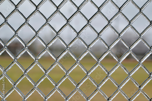 icy chain link fence