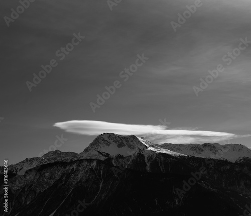 mountain during winter with clouds