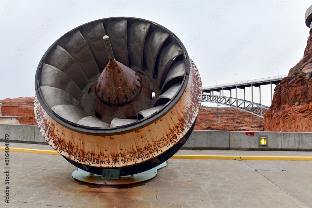 Large turbine used in hydroelectric dam projects to produce renewable electricity