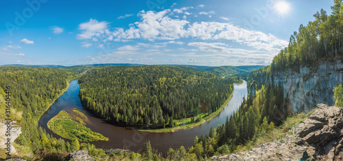 Beautiful panoramic view of the river Usva, Perm Krai, and on a rock the devil's finger in the summer.