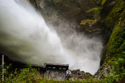 'Pailon Del Diablo' waterfall, huge canyon on the city of Banos, Ecuador
