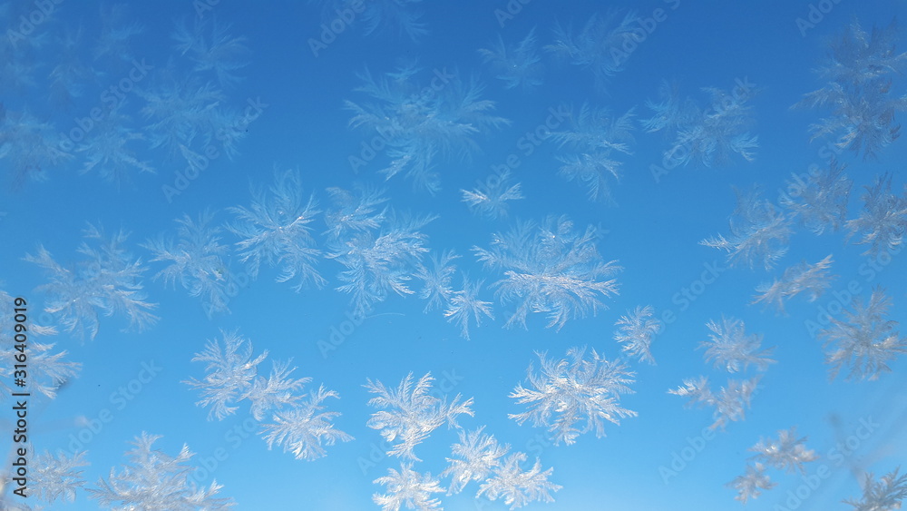 blue winter background with snowflakes blue winter background with snowflakes