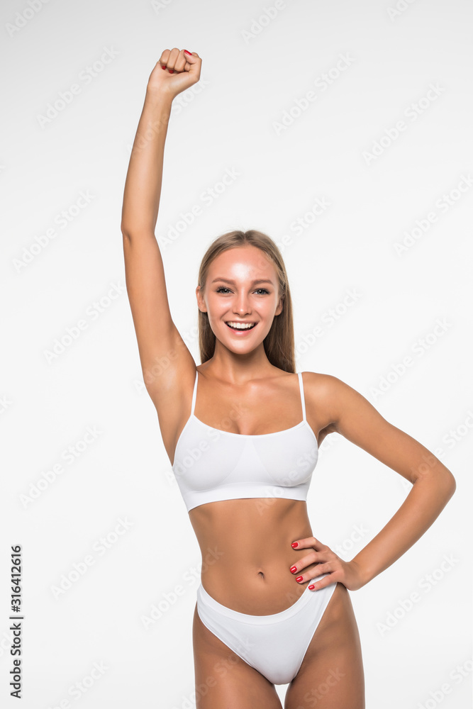 Beautiful slim body of woman in white underwear isolated on white background Beautiful slim body of woman in white underwear isolated on white background